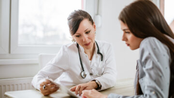 Charming,Female,Doctor,Giving,Advice,To,A,Female,Patient.